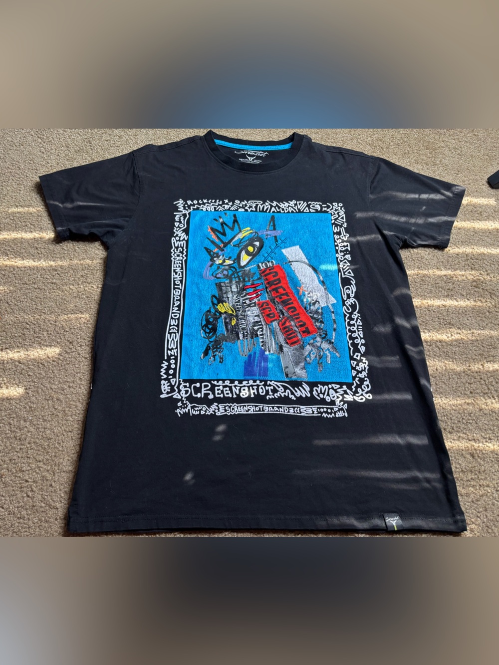 Screenshot Black Short Sleeve Graphic Tee with Blue Front Panel